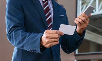 man with business card