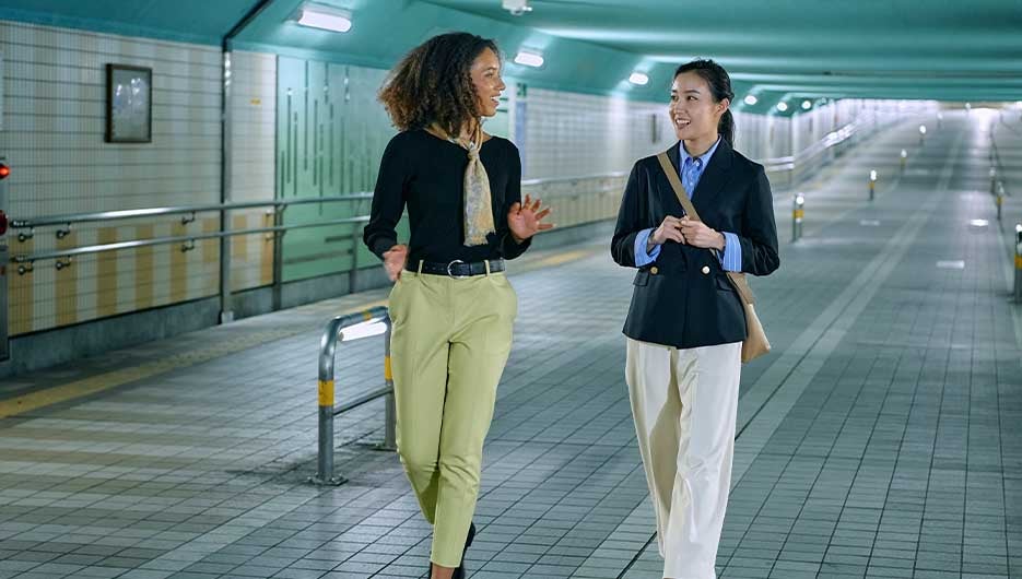 women at train station