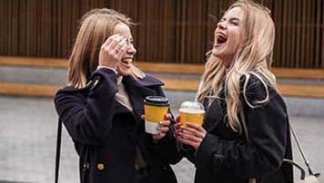 two women laughing