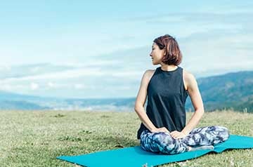 woman exercising outdoors