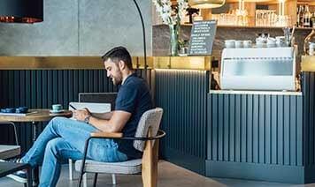 man sitting cafe